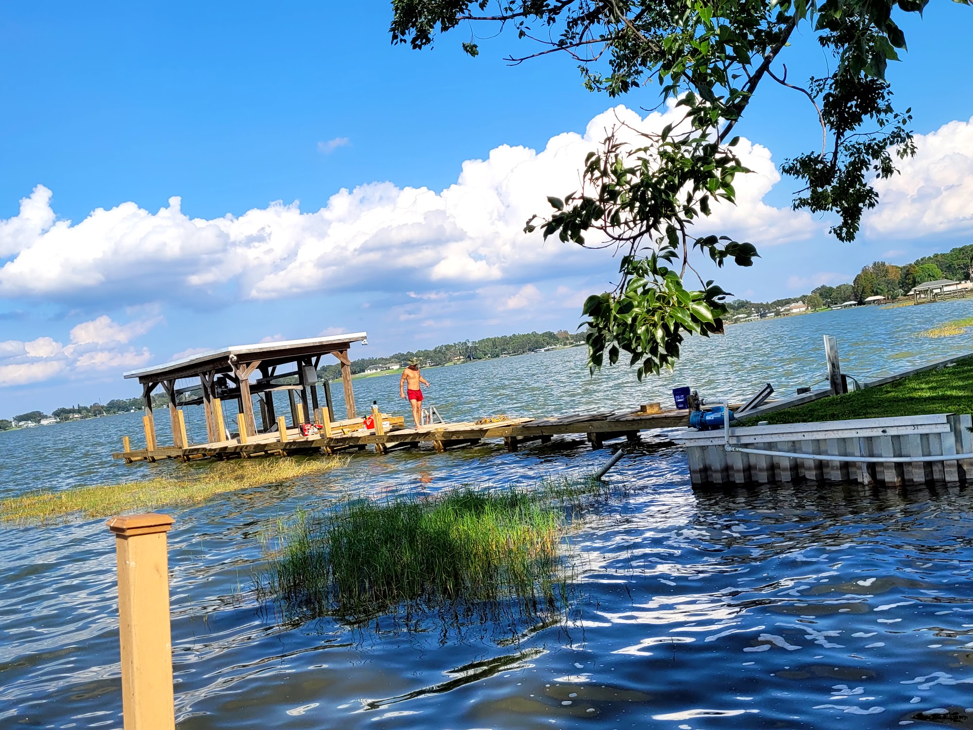 Completed dock viewed from shore on a bright day
