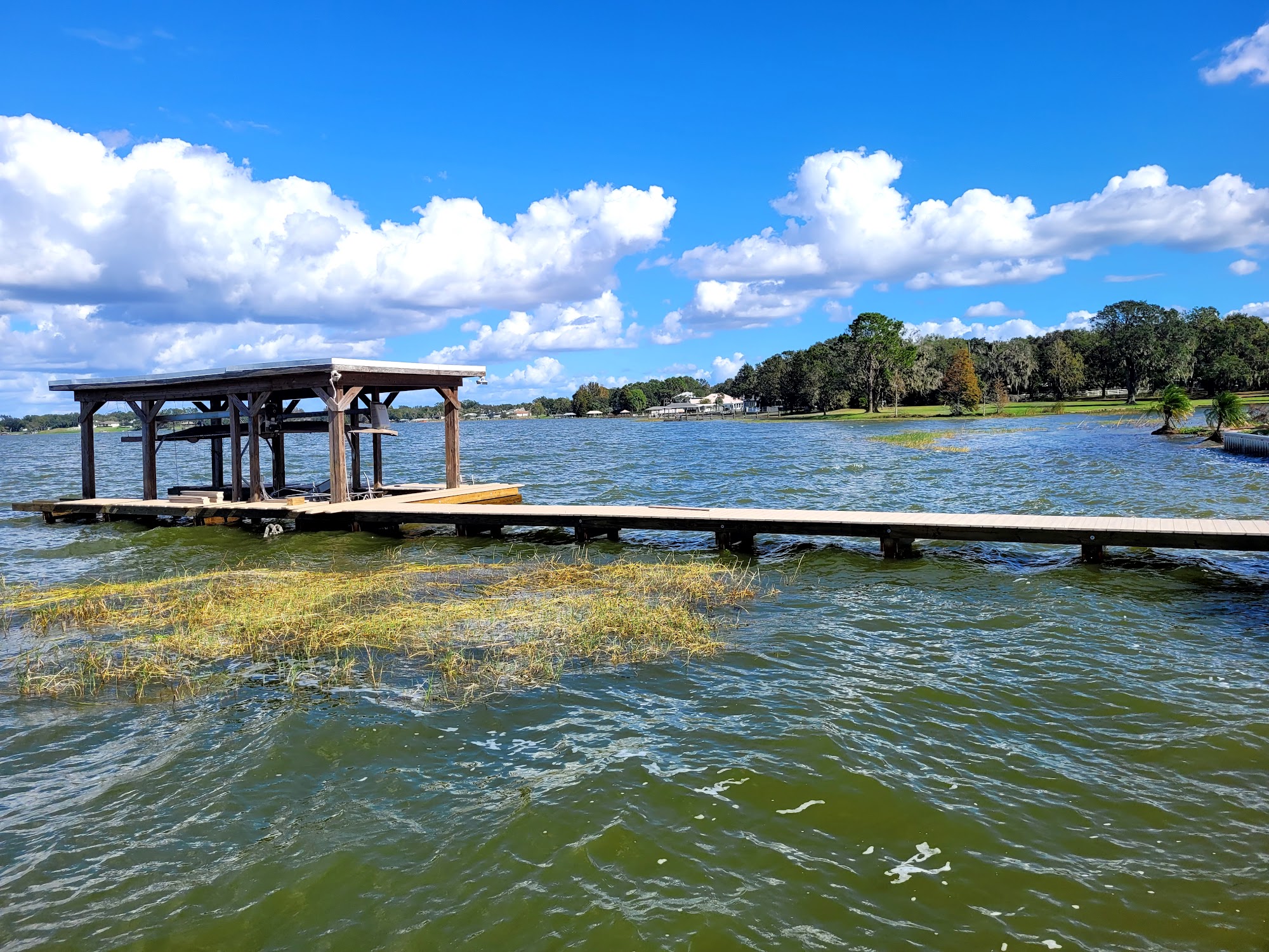 Custom dock on bright blue water