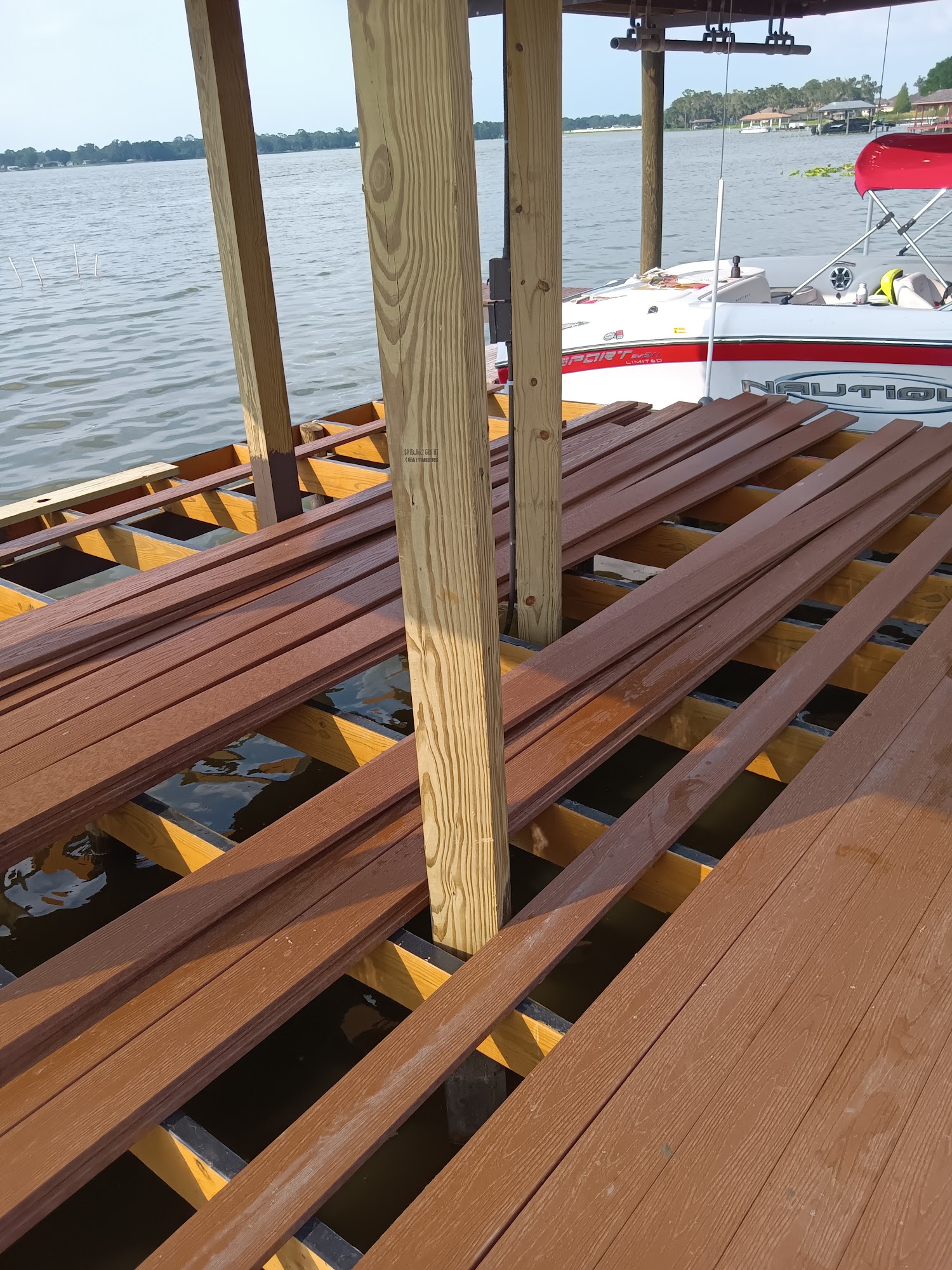 Detailed craftsmanship on stained dock railings