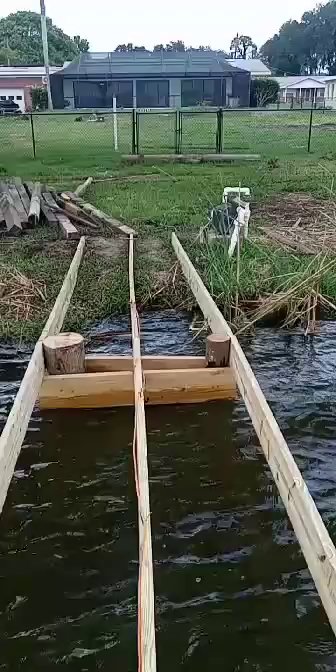 New dock supports extending into the water